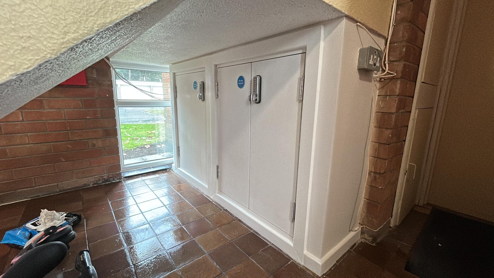 Completed certified fire door installation around an electric cupboard, Liverpool